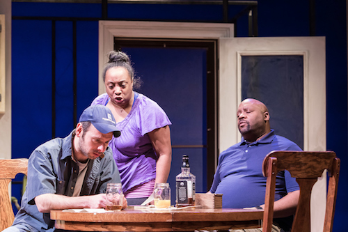 Actor Cassaundra Freeman berates Actor David Bendena at the dinner table